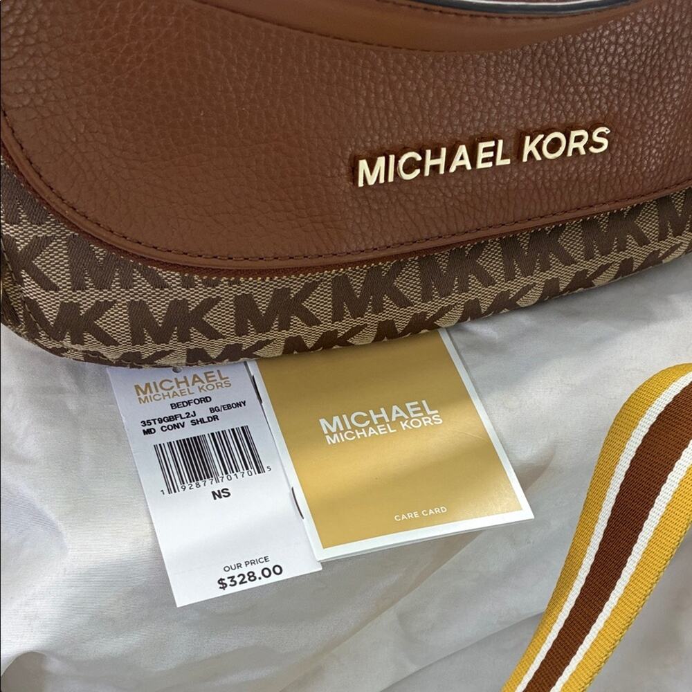 Michael Kors Brown and Tan Messenger Crossbody Bag with thick crossbody strap. - Picture 5 of 11